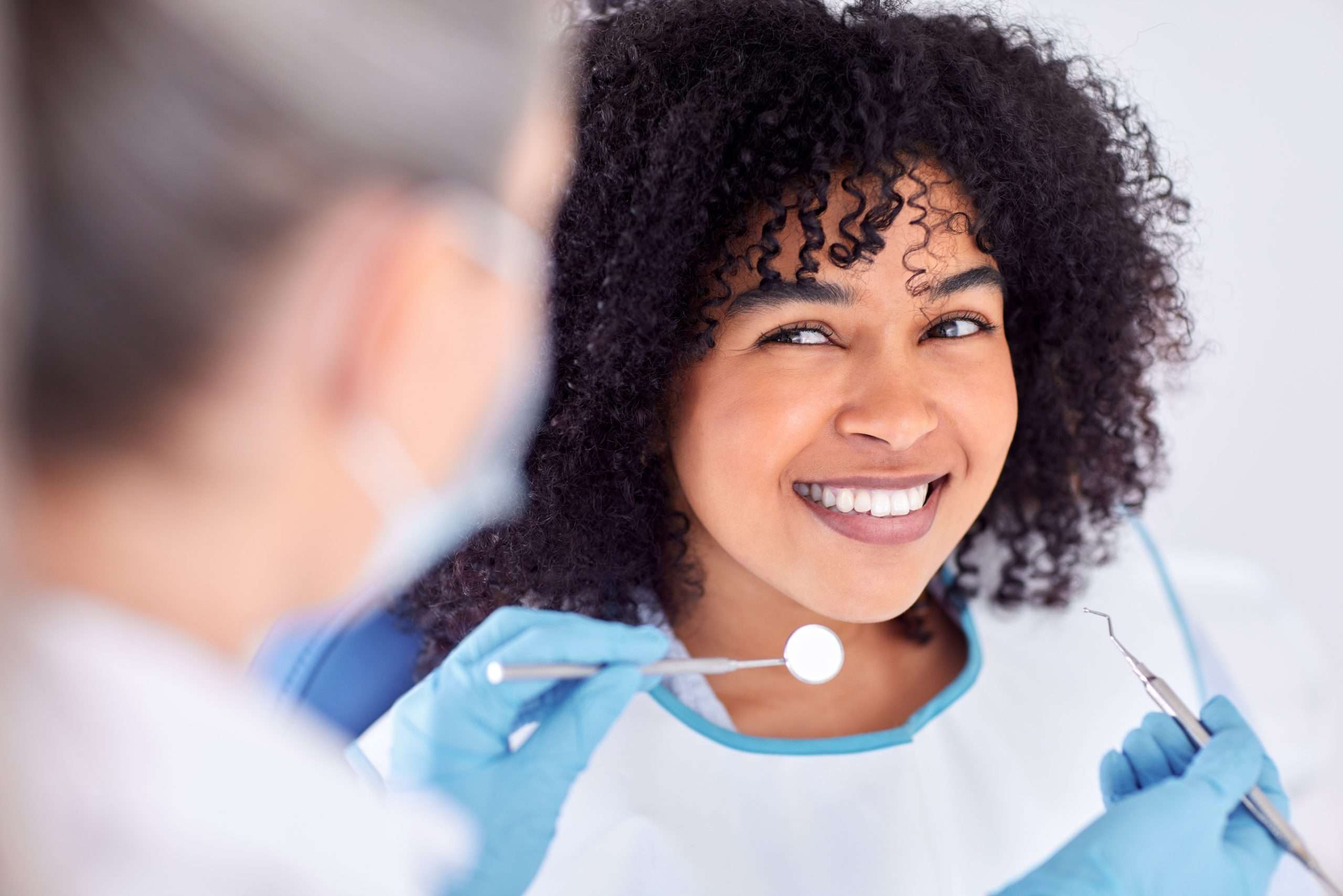 patient smiling to dentist